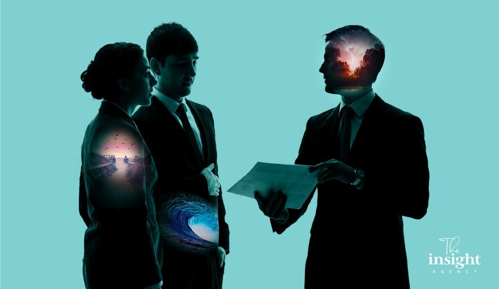 Three people in a consultation, double-exposure treatment.